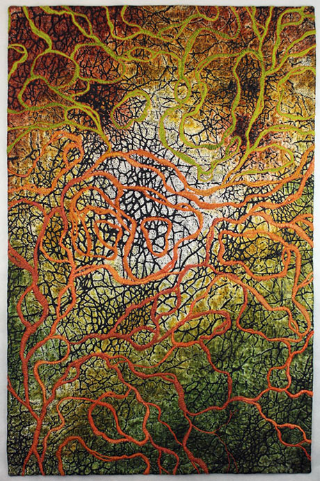 A vibrant textile artwork featuring a web of organic, cracked patterns in orange, black, and green hues, resembling flowing roots or veins. A vibrant textile artwork featuring a web of organic, cracked patterns in orange, black, and green hues, resembling flowing roots or veins.