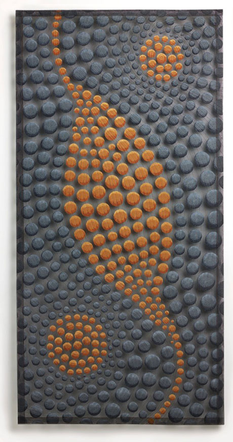 Abstract artwork featuring a swirling pattern of gray and orange textured circles on a dark background. Abstract artwork featuring a swirling pattern of gray and orange textured circles on a dark background.