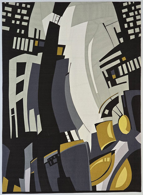 Abstract quilt artwork featuring geometric shapes in shades of black, gray, and yellow, evoking a modern city skyline.