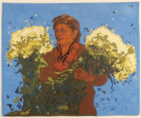 Painterly textile image by Kathleen McCabe of a person holding two large bouquets of white flowers against a blue background with scattered small shapes.